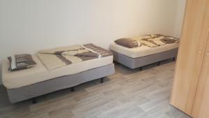 Posteľ alebo postele v izbe v ubytovaní Apartmán u červeného kostela + 2 fotografie