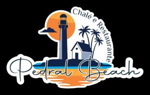 a lighthouse on the beach with the words real beach at Pedral Beach chalé e restaurante in Parnaíba
