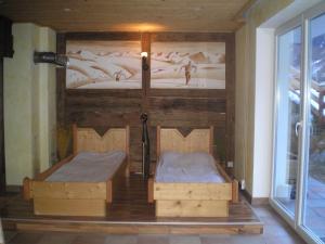 Кровать или кровати в номере Aparthaus Aktiv