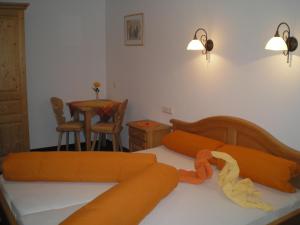 Кровать или кровати в номере Aparthaus Aktiv