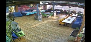 an overhead view of a restaurant with tables and chairs at Zora apartment in Rohtak