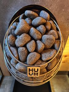 a bowl of donuts sitting on top of a table at XYZ Niseko in Niseko