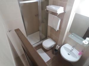 Koupelna v ubytování Hosta Otel