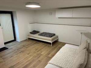a room with a bed and a couch in it at City center in Čadca