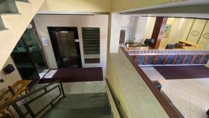 a view of a lobby of a building at Tawfiqs Hotel in Barra do Garças
