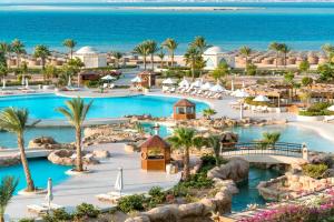 an aerial view of a resort with a pool at Kempinski Hotel Soma Bay in Hurghada