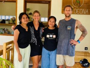 a group of people posing for a picture at SA Oeona Bungalow in Nembrala