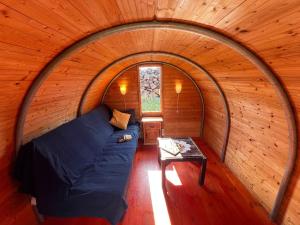 a small room with a bed and a table at The Secret Garden Lanzarote in Haría