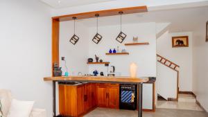 a kitchen with a counter and a sink at AG Comfort Homes in Nkunjila