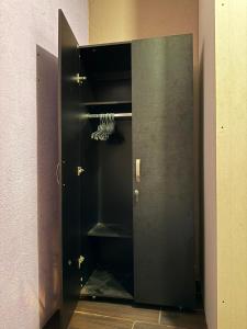 an open door to a locker room with a closet at Casa ZANATE in Guatemala +39 photos
