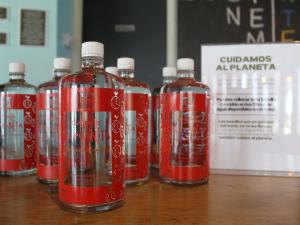 a group of soda bottles sitting on a table at Ibis Culiacan in Culiacán