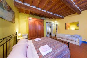 a bedroom with a bed in a room at il Giglio di San Giovanni in Florence