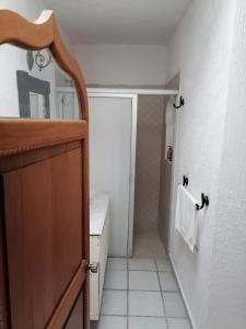 a small bathroom with a toilet and a sink at Hotel Marina Palace Tequesquitengo in Tequesquitengo +44 photos
