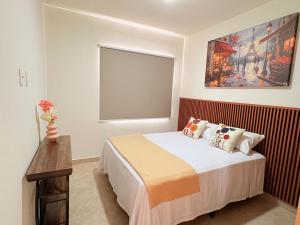 a bedroom with a bed and a large window at AdyHouse Ziré in Buena Vista +127 photos
