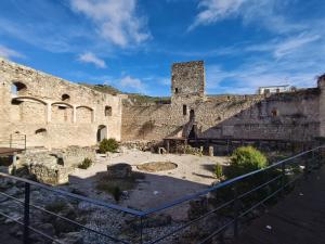 a view of a building with a castle at Entre Murallas in Doña Mencía