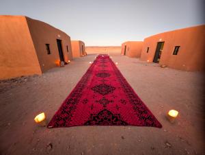 a red carpet in the middle of a street at Sahara Peace in Mhamid