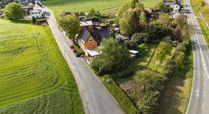an aerial view of a small house on a road at 115 qm Apartment für bis zu 8 Personen mit 4 Schlafzimmern in Lünen +8 photos