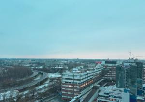 an aerial view of a city with buildings at Rheinpanorama Penthouse Neuss Düsseldorf in Neuss
