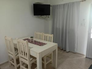 TV a/nebo společenská místnost v ubytování Costa Termal 4 + 4 fotografie