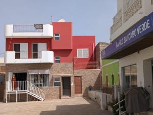 a group of buildings in front of a building at Apartamento Espargos in Espargos