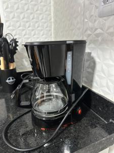 a blender sitting on top of a counter at Casa no Centro in Corumbá