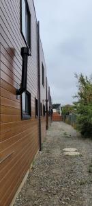 a row of windows on the side of a building at Cabañas San Pedro in Arauco