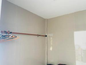 a bathroom with white walls and a shower stall at Paradise view A7-Kantiang paradise resort- in Ko Bu Bu