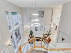 a large living room with a table and chairs at Captivating 6BR 3B Home with Pool & Fire Pit in Mesquite +60 photos