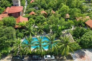 an aerial view of a resort with a swimming pool at Trang An Lighthouse Homestay in Ninh Binh