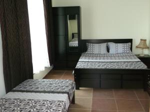 Letto o letti in una camera di Marshal Resort Kobuleti