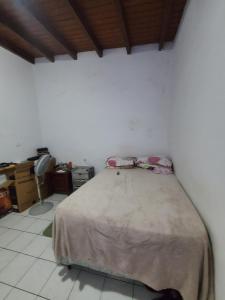 a bedroom with a bed with a blanket on it at Palm Beach 278 in Palm-Eagle Beach