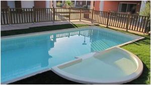 Bazén v ubytování Corsappart nebo v jeho okolí