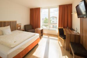 Postel nebo postele na pokoji v ubytování Hotel Meridian ***superior