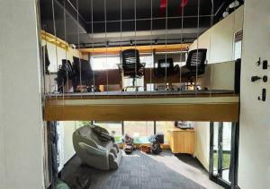 an overhead view of an office with desks and chairs at Nap Junction in Pune