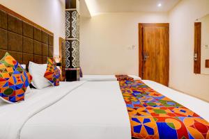 FabHotel Abrol Suites 객실 침대 사진 26개 이상