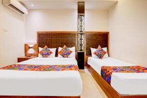 FabHotel Abrol Suites 객실 침대