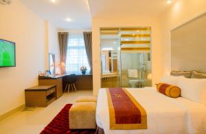 Ένα ή περισσότερα κρεβάτια σε δωμάτιο στο Smile Hotel