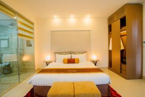 Ένα ή περισσότερα κρεβάτια σε δωμάτιο στο Smile Hotel