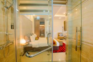 Ένα ή περισσότερα κρεβάτια σε δωμάτιο στο Smile Hotel