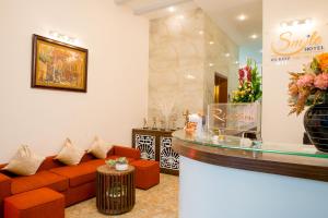 Χώρος καθιστικού στο Smile Hotel