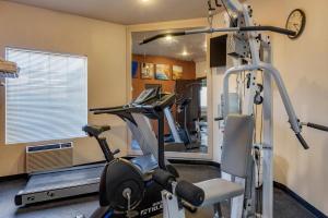 a gym with a treadmill and a exercise bike at Comfort Inn Columbia Gorge in The Dalles
