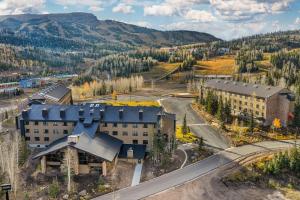 an aerial view of a building with mountains in the background at Hilton Vacation Club Cedar Breaks Brian Head in Brian Head