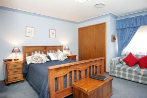 Ένα ή περισσότερα κρεβάτια σε δωμάτιο στο Lavender House Bed & Breakfast
