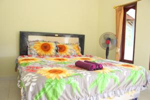 Postel nebo postele na pokoji v ubytování Join Homestay