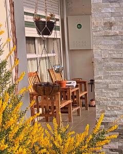 a patio with a table and chairs on a porch at Private big ROOM 20mins to Airport, 5mins to station in St Albans