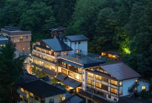 an aerial view of a building with lights at Hinanoyado Chitose in Tokamachi