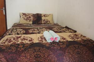 Postel nebo postele na pokoji v ubytování Join Homestay