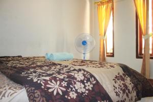 Postel nebo postele na pokoji v ubytování Join Homestay