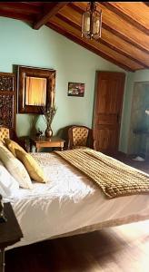 a bedroom with a large bed in a room at Séjour Royal in Xàtiva +21 photos