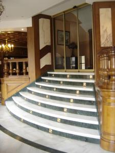 a group of stairs in a hotel lobby at Hotel Aranda in Aranda de Duero